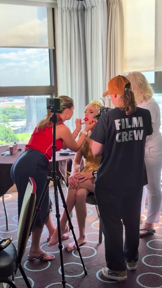 Makeup touch-up on set, camera ready